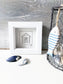 Limited edition framed Beach Hut hand-drawn illustration by Ali Collins, presented in a white gift box