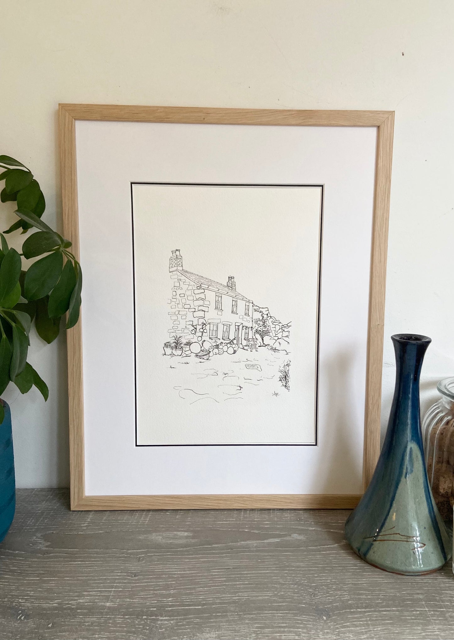 Hand-drawn Penberth house portrait commission in an oak frame — Ali Collins Illustration