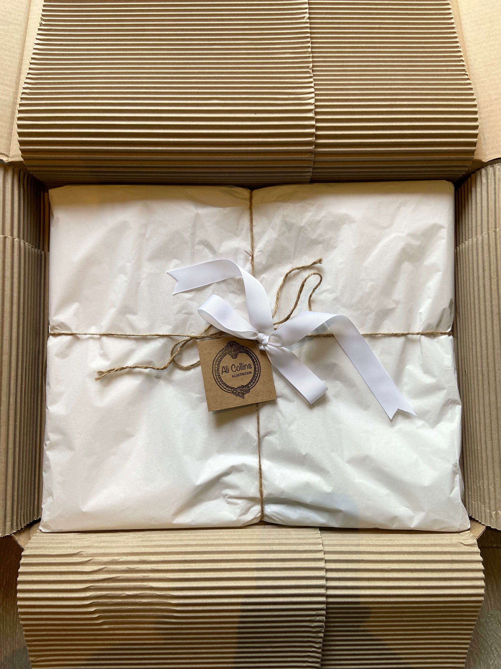 Hand-drawn house portrait commission wrapped, packaged and boxed ready for delivery — Ali Collins Illustration