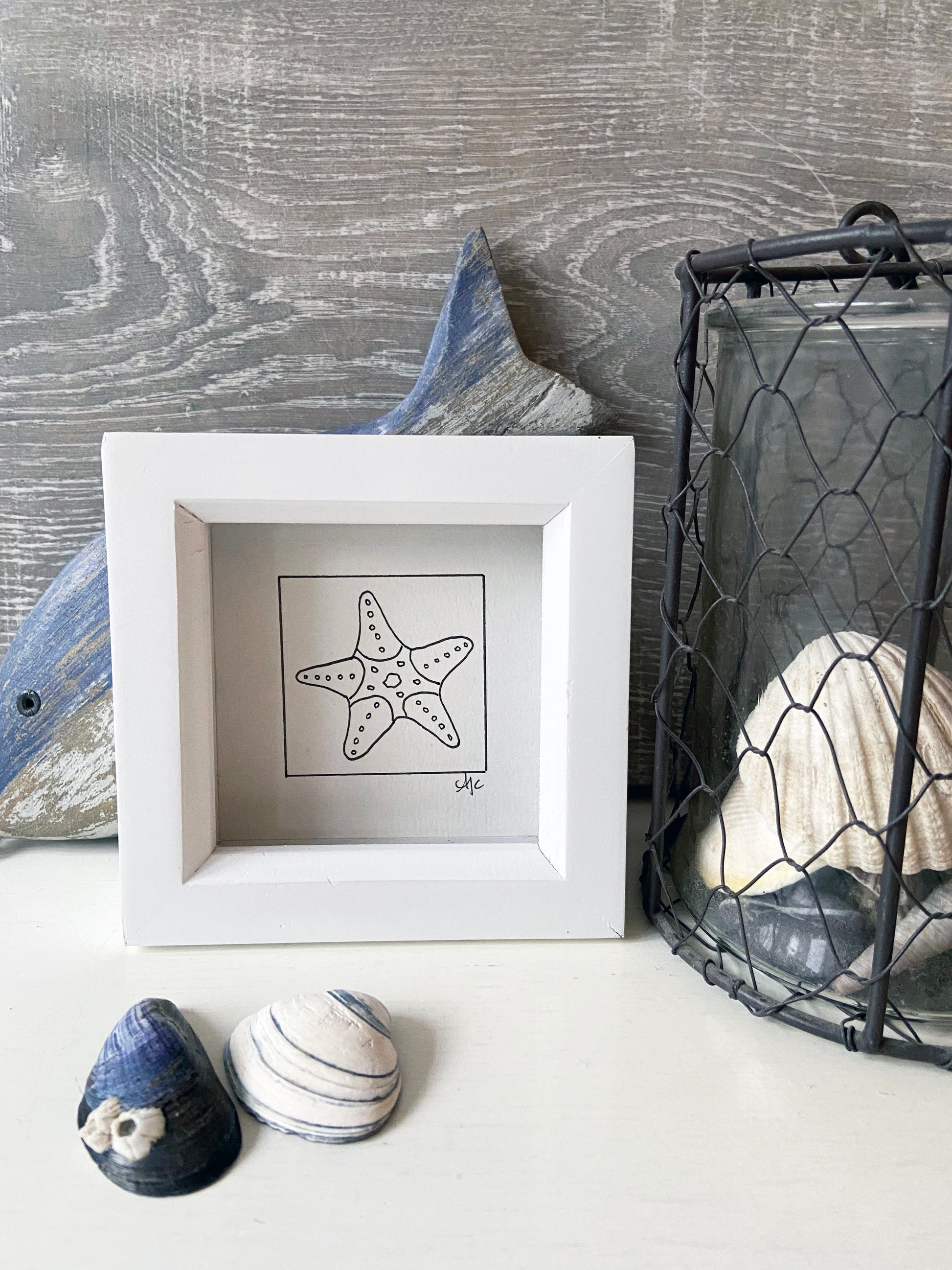 Limited edition framed Starfish hand-drawn illustration by Ali Collins, presented in a white gift box