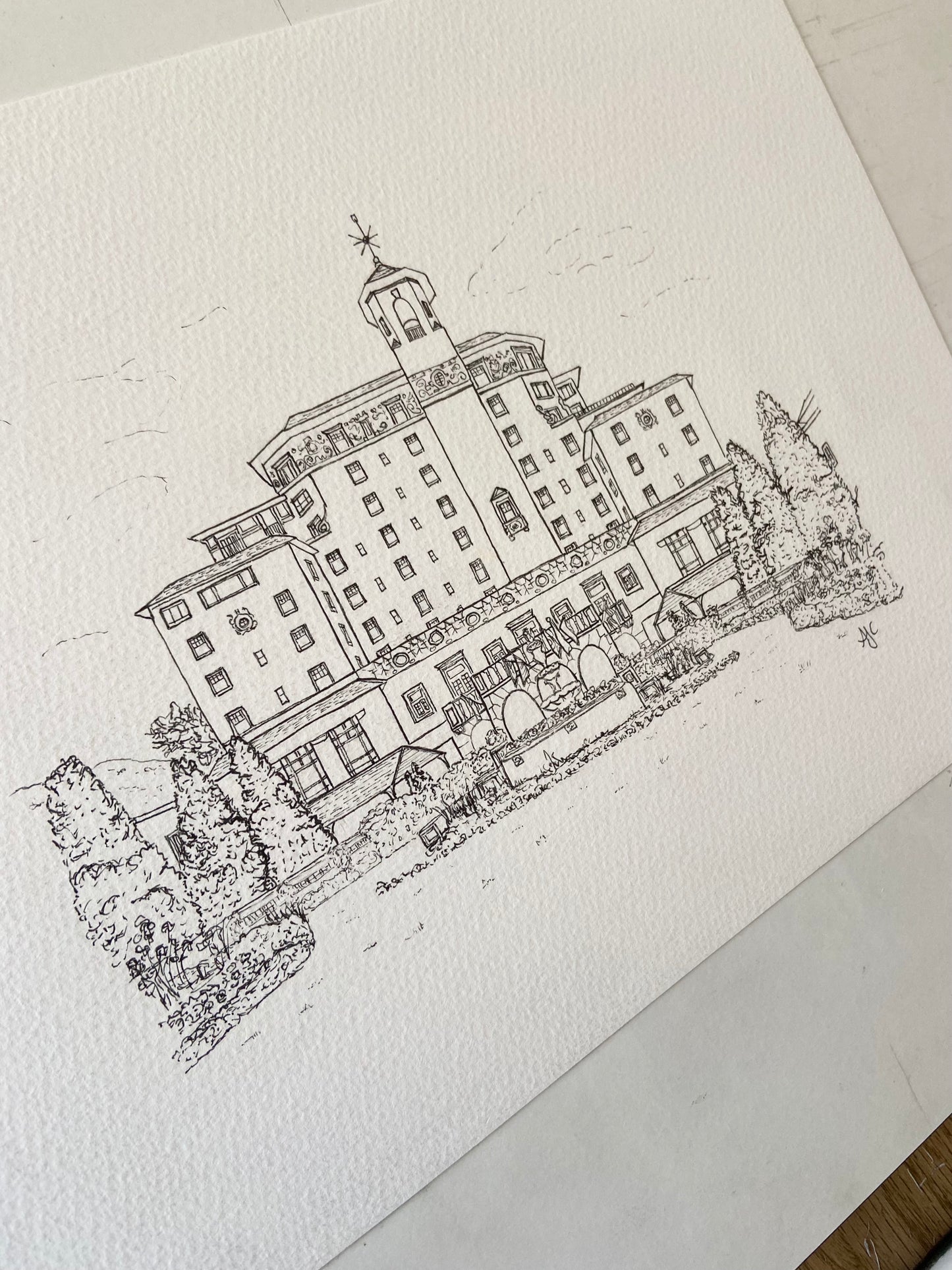 Hand-drawn line illustration of The Broadmoor wedding venue — custom ink drawing by Ali Collins.