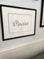 Framed Yellowstone barns illustration print in lifestyle setting — hand-signed original art by Ali Collins