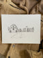 Yellowstone barns illustration print in lifestyle setting — hand-drawn original art by Ali Collins